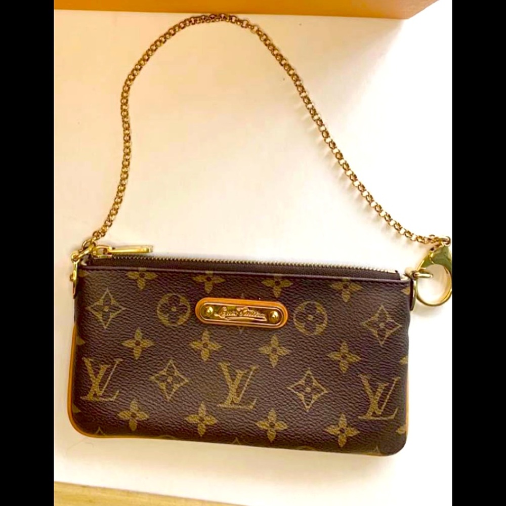 Authentic Louis Vuitton Vintage Pochette w/ original LV gold chain.